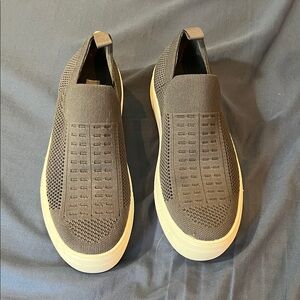 Gray slip ons.  Very little wear